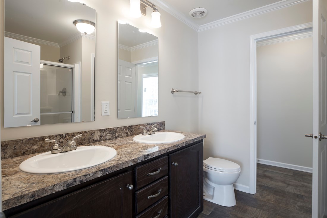 The 2089 52X28 3+2 HERITAGE Master Bathroom. This Manufactured Mobile Home features 3 bedrooms and 2 baths.