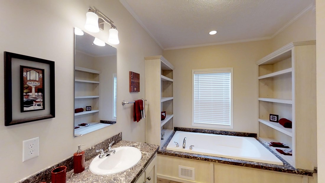 The 2917 HERITAGE Primary Bathroom. This Manufactured Mobile Home features 4 bedrooms and 2 baths.