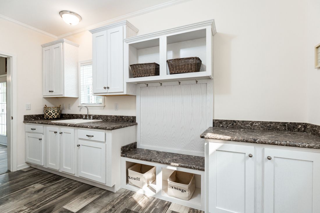 The 1714 HERITAGE Utility Room. This Manufactured Mobile Home features 3 bedrooms and 2 baths.