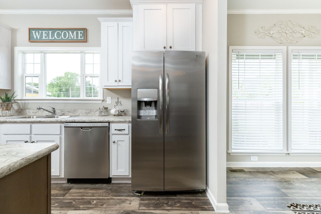 The 1714 HERITAGE Kitchen. This Manufactured Mobile Home features 3 bedrooms and 2 baths.